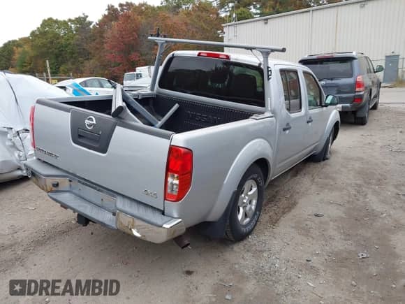 2012 Nissan Frontier SL z VIN 1N6AD0EV2CC472178, wystawiony jako IAAI lot #43564057 z przebiegiem 44 893 mil mil oraz . Historia ofert i sprzedaży dostępna na DreamBid. Obrazek 4.