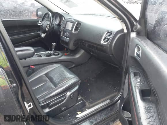 2013 Dodge Durango R/T with VIN 1C4SDJCT8DC638056, listed as a IAAI auction lot 42260663 with 201,316 mi miles and . Bid and sale history available at DreamBid. Image 5.