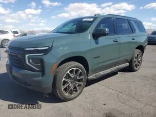 2025 Chevrolet Tahoe RST с VIN 1GNS6RRDXSR321115, выставлен на аукционе Copart как лот 81691325 с пробегом 3 915 миль миль и Списание • Salvage title. История ставок и продаж доступна на DreamBid. Изображение 1.
