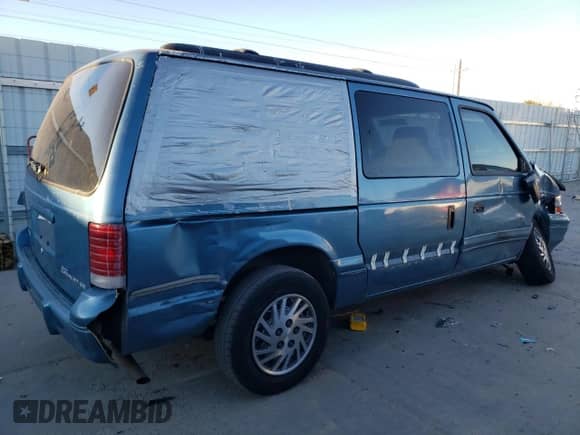 1994 Dodge Caravan Grand SE with VIN 1B4GH44R1RX330819, listed as a Copart auction lot 83548684 with 187,408 mi miles and Salvage title. Bid and sale history available at DreamBid. Image 3.