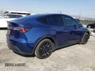 2021 Tesla Model Y Long Range with VIN 5YJYGAEE4MF302634, listed as a Copart auction lot 66761944 with 48,629 mi miles and Salvage title. Bid and sale history available at DreamBid. Image 3.