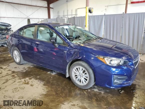 2018 Subaru Impreza Premium with VIN 4S3GKAB65J3621850, listed as a Copart auction lot 63196235 with 50,973 mi miles and Salvage title. Bid and sale history available at DreamBid. Image 4.