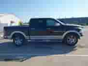 2012 Ram 1500 Laramie with VIN 1C6RD7NT5CS306229, listed as a IAAI auction lot 43373111 with 227,543 mi miles and . Bid and sale history available at DreamBid. Image 14.