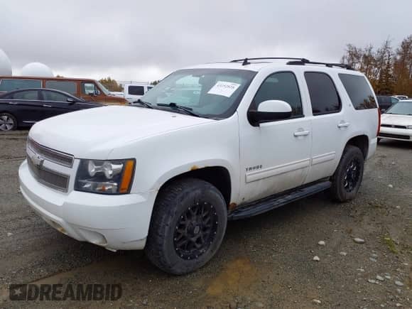 2011 Chevrolet Tahoe LT with VIN 1GNSKBE08BR212318, listed as a IAAI auction lot 43252828 with 190,901 mi miles and . Bid and sale history available at DreamBid. Image 2.