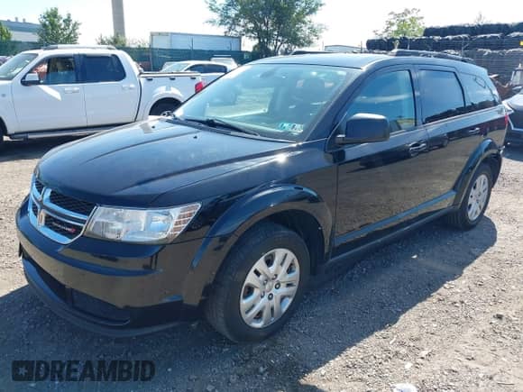 2019 Dodge Journey SE Value with VIN 3C4PDCAB9KT872056, listed as a IAAI auction lot 43206303 with 96,372 mi miles and . Bid and sale history available at DreamBid. Image 2.