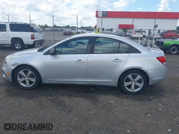 2015 Chevrolet Cruze LS with VIN 1G1PB5SH9F7213269, listed as a IAAI auction lot 42627784 with 164,932 mi miles and . Bid and sale history available at DreamBid. Image 15.