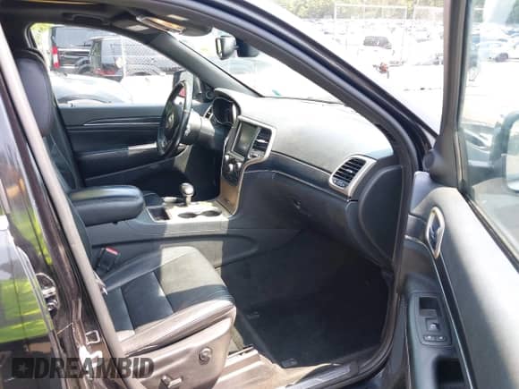 2014 Jeep Grand Cherokee Limited с VIN 1C4RJEBG8EC138094, выставлен на аукционе IAAI как лот 42718856 с пробегом 126 243 миль миль и . История ставок и продаж доступна на DreamBid. Изображение 5.