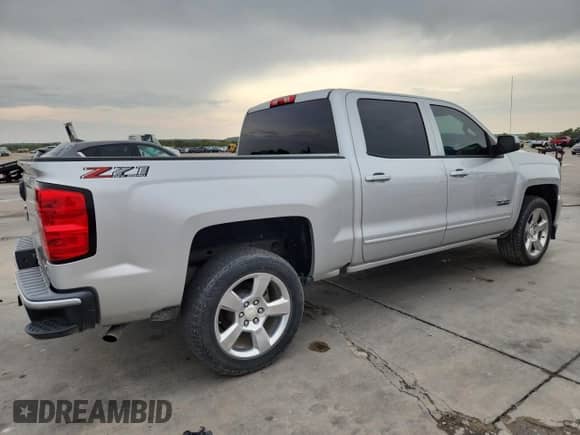 2018 Chevrolet Silverado 1500 LT с VIN 3GCUKREC6JG594318, выставлен на аукционе Copart как лот 89498325 с пробегом 175 619 миль миль и Чистый • Clean title. История ставок и продаж доступна на DreamBid. Изображение 3.