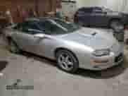 2002 Chevrolet Camaro Z28 z VIN 2G1FP22G722136888, wystawiony jako Copart lot #75919614 z przebiegiem 83 954 mil mil oraz Szkoda całkowita • Salvage title. Historia ofert i sprzedaży dostępna na DreamBid. Obrazek 4.