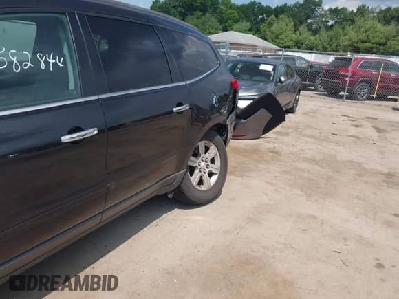 2012 Chevrolet Traverse 2LT with VIN 1GNKVJED6CJ330498, listed as a IAAI auction lot 42582844 with 131,057 mi miles and . Bid and sale history available at DreamBid. Image 6.