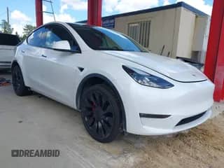 2022 Tesla Model Y Performance with VIN 7SAYGDEF1NF312195, listed as a IAAI auction lot 43307439 with 58,135 mi miles and . Bid and sale history available at DreamBid. Image 1.
