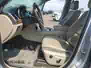 2011 Jeep Grand Cherokee Overland Summit with VIN 1J4RR6GTXBC536210, listed as a Copart auction lot 62634765 with 129,835 mi miles and Salvage title. Bid and sale history available at DreamBid. Image 7.