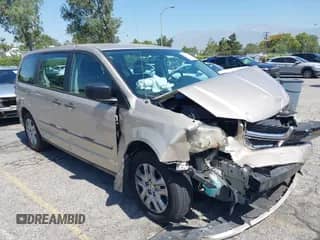 2014 Dodge Grand Caravan SE with VIN 2C4RDGBG2ER316379, listed as a IAAI auction lot 42531072 with 140,095 mi miles and . Bid and sale history available at DreamBid. Image 1.