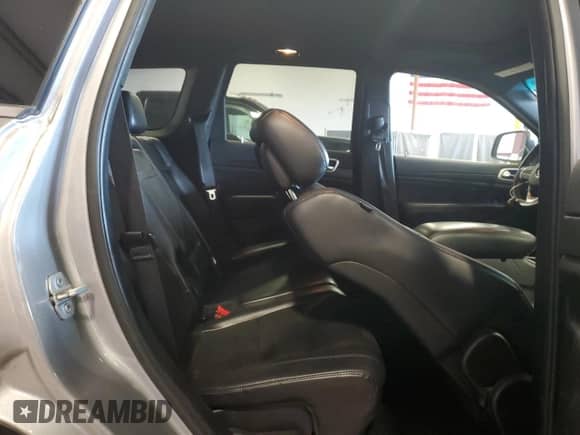 2015 Jeep Grand Cherokee Altitude z VIN 1C4RJFAG2FC157698, wystawiony jako Copart lot #70369305 z przebiegiem 142 461 mil mil oraz Szkoda całkowita • Salvage title. Historia ofert i sprzedaży dostępna na DreamBid. Obrazek 10.