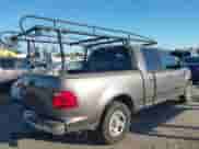 2003 Ford F-150 XLT z VIN 1FTRW07L53KB69428, wystawiony jako IAAI lot #43473977 z przebiegiem 241 209 mil mil oraz . Historia ofert i sprzedaży dostępna na DreamBid. Obrazek 4.