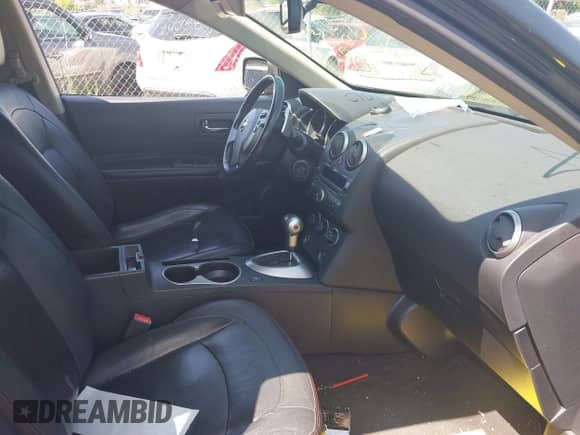 2009 Nissan Rogue S with VIN JN8AS58V69W161396, listed as a IAAI auction lot 40182355 with 169,812 mi miles and . Bid and sale history available at DreamBid. Image 5.