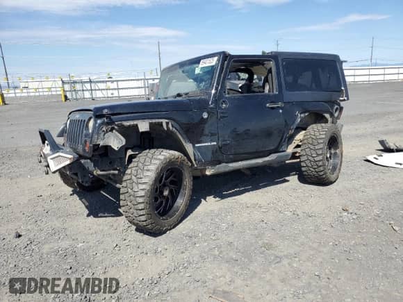 2013 Jeep Wrangler Sport with VIN 1C4AJWAG2DL547243, listed as a Copart auction lot 69401525 with Not provided miles and Salvage title. Bid and sale history available at DreamBid. Image 1.