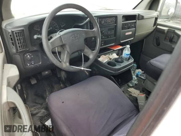 2003 Chevrolet Express Cargo with VIN 1GCGG25V931223419, listed as a Copart auction lot 76194064 with Not provided miles and Salvage title. Bid and sale history available at DreamBid. Image 8.