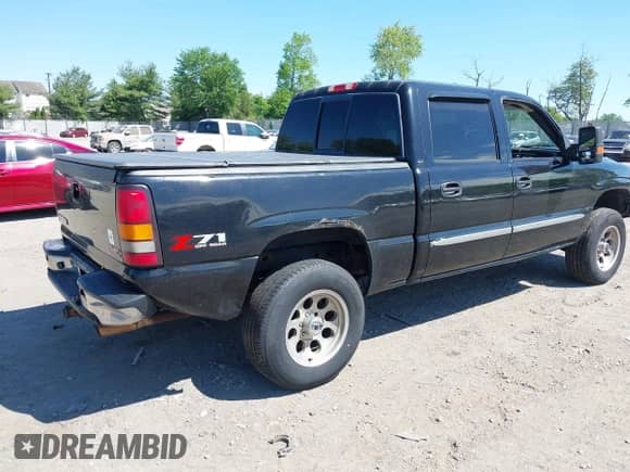 2006 GMC Sierra 1500 SLT with VIN 2GTEK13T261243348, listed as a IAAI auction lot 42210751 with 241,547 mi miles and . Bid and sale history available at DreamBid. Image 4.
