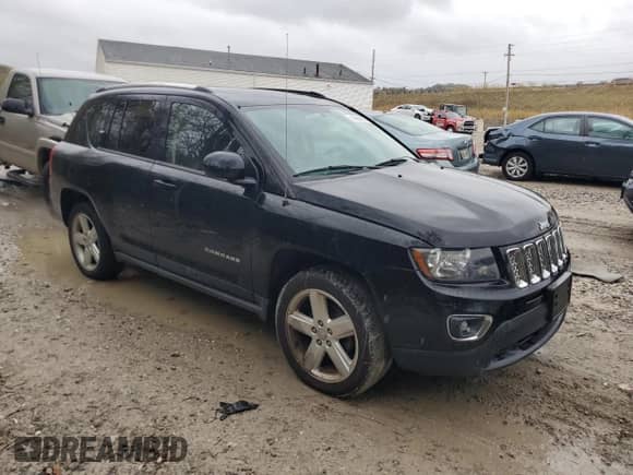 2014 Jeep Compass Latitude with VIN 1C4NJCEA5ED732288, listed as a Copart auction lot 82689185 with 102,856 mi miles and Clean title. Bid and sale history available at DreamBid. Image 4.