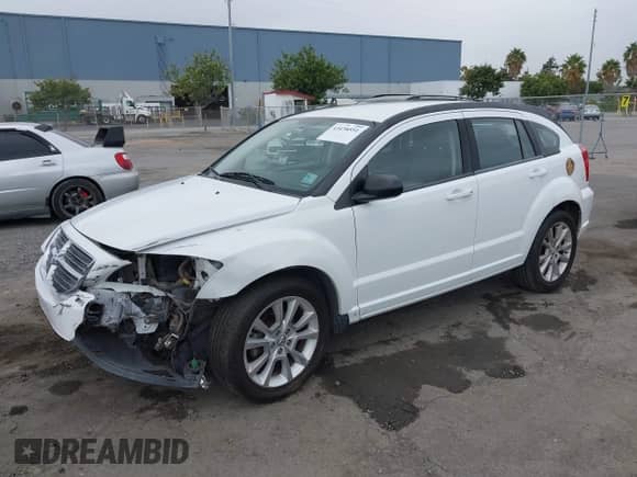 2011 Dodge Caliber Heat with VIN 1B3CB5HA1BD172908, listed as a IAAI auction lot 43438551 with 153,540 mi miles and . Bid and sale history available at DreamBid. Image 17.