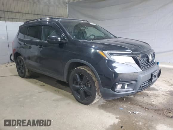 2019 Honda Passport Elite с VIN 5FNYF8H08KB009375, выставлен на аукционе Copart как лот 63916565 с пробегом 122 013 миль миль и Списание • Salvage title. История ставок и продаж доступна на DreamBid. Изображение 4.