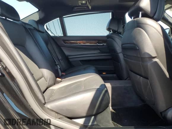 2013 BMW 7 Series 750Li xDrive с VIN WBAYF8C50DD140715, выставлен на аукционе Copart как лот 80479335 с пробегом 106 285 миль миль и Списание • Salvage title. История ставок и продаж доступна на DreamBid. Изображение 10.