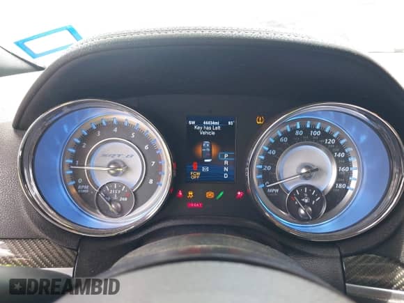 2014 Chrysler 300 SRT-8 с VIN 2C3CCAFJ6EH156853, выставлен на аукционе IAAI как лот 42370748 с пробегом 44 434 миль миль и . История ставок и продаж доступна на DreamBid. Изображение 7.