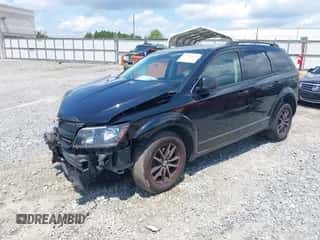2018 Dodge Journey SE with VIN 3C4PDCAB0JT157987, listed as a IAAI auction lot 42995989 with 128,143 mi miles and . Bid and sale history available at DreamBid. Image 2.