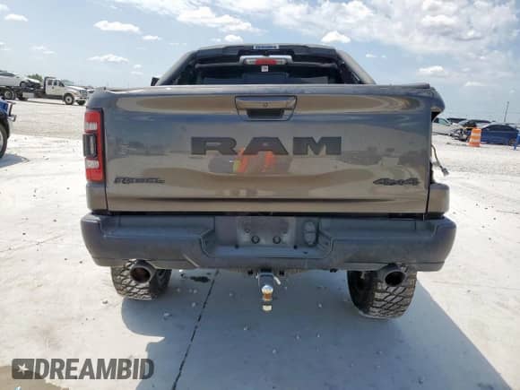 2020 Ram 1500 Rebel z VIN 1C6SRFLT2LN199221, wystawiony jako Copart lot #68965755 z przebiegiem 49 714 mil mil oraz Szkoda całkowita • Salvage title. Historia ofert i sprzedaży dostępna na DreamBid. Obrazek 6.