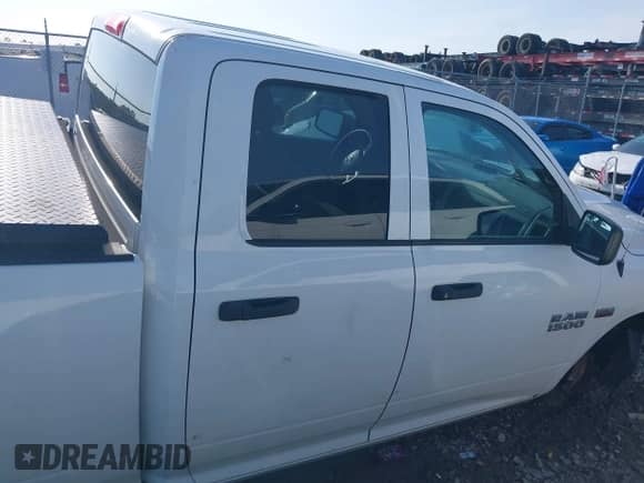 2016 Ram 1500 Tradesman with VIN 1C6RR6FT5GS292848, listed as a IAAI auction lot 42460665 with 127,818 mi miles and . Bid and sale history available at DreamBid. Image 13.