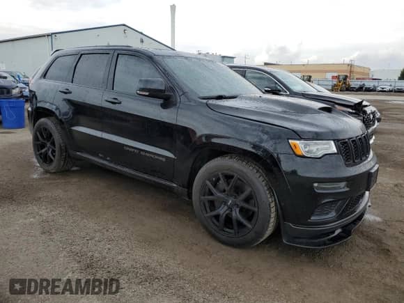 2019 Jeep Grand Cherokee Summit with VIN 1C4RJFJTXKC812973, listed as a Copart auction lot 80828705 with 88,061 mi miles and Clean title. Bid and sale history available at DreamBid. Image 4.