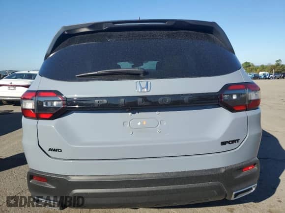 2025 Honda Pilot Sport с VIN 5FNYG1H34SB039780, выставлен на аукционе Copart как лот 81126435 с пробегом 16 888 миль миль и Списание • Salvage title. История ставок и продаж доступна на DreamBid. Изображение 6.