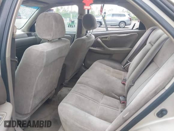 1998 Toyota Camry LE z VIN 4T1BG22K9WU242300, wystawiony jako IAAI lot #42341455 z przebiegiem Nie podano mil oraz . Historia ofert i sprzedaży dostępna na DreamBid. Obrazek 8.