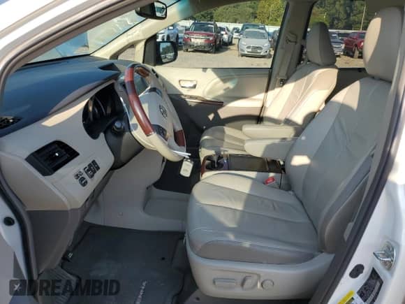 2012 Toyota Sienna XLE AAS with VIN 5TDYK3DC3CS198576, listed as a Copart auction lot 80911565 with 95,740 mi miles and Salvage title. Bid and sale history available at DreamBid. Image 7.