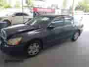 2005 Honda Accord LX with VIN 1HGCM66305A004798, listed as a IAAI auction lot 42514155 with 150,950 mi miles and . Bid and sale history available at DreamBid. Image 14.