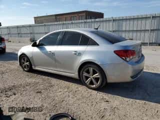 2014 Chevrolet Cruze 2LT z VIN 1G1PE5SB9E7271576, wystawiony jako Copart lot #62423055 z przebiegiem 169 924 mil mil oraz Szkoda całkowita • Salvage title. Historia ofert i sprzedaży dostępna na DreamBid. Obrazek 2.