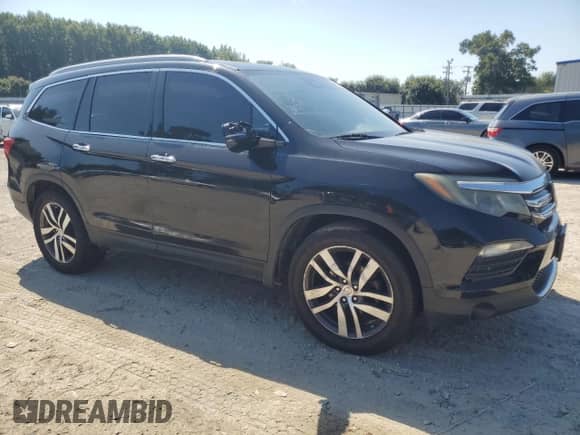 2016 Honda Pilot Elite с VIN 5FNYF6H00GB037005, выставлен на аукционе Copart как лот 69608935 с пробегом Не указан миль и Списание • Salvage title. История ставок и продаж доступна на DreamBid. Изображение 4.