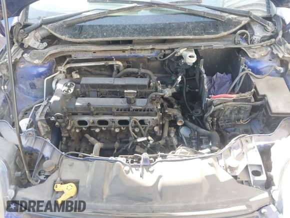 2014 Ford Focus Titanium z VIN 1FADP3N27EL169470, wystawiony jako IAAI lot #43073602 z przebiegiem 244 891 mil mil oraz . Historia ofert i sprzedaży dostępna na DreamBid. Obrazek 10.