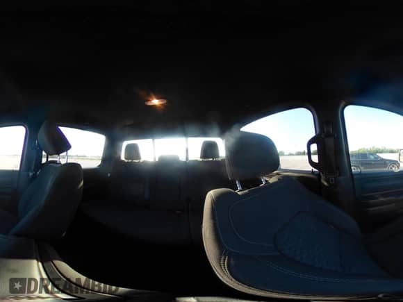 2025 Ram 1500 Tradesman with VIN 1C6RREGGXSN634409, listed as a IAAI auction lot 42945287 with 5,990 mi miles and . Bid and sale history available at DreamBid. Image 18.