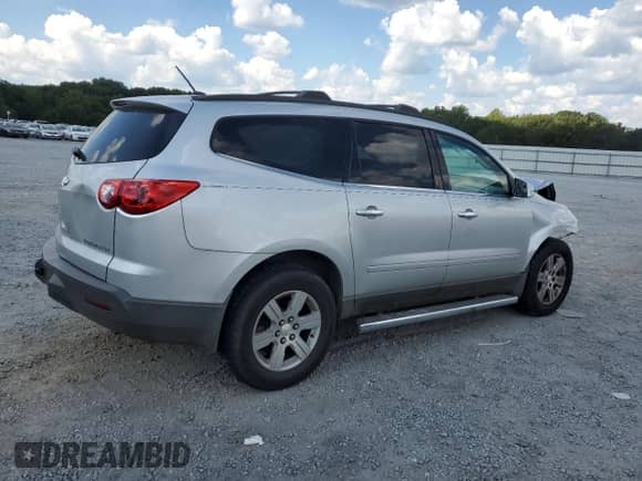 2011 Chevrolet Traverse 1LT с VIN 1GNKRGED4BJ377258, выставлен на аукционе Copart как лот 81480225 с пробегом 170 683 миль миль и Списание • Salvage title. История ставок и продаж доступна на DreamBid. Изображение 3.