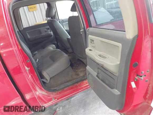 2005 Dodge Dakota SLT with VIN 1D7HW48N65S366085, listed as a IAAI auction lot 43206475 with 187,820 mi miles and . Bid and sale history available at DreamBid. Image 8.