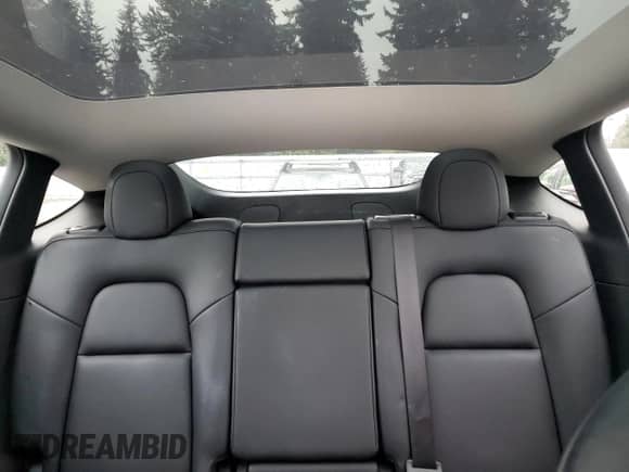 2022 Tesla Model Y Long Range с VIN 7SAYGAEE1NF429863, выставлен на аукционе Copart как лот 85758435 с пробегом 20 389 миль миль и Списание • Salvage title. История ставок и продаж доступна на DreamBid. Изображение 10.