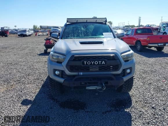 2019 Toyota Tacoma SR z VIN 5TFCZ5AN8KX193437, wystawiony jako IAAI lot #43278180 z przebiegiem 70 048 mil mil oraz . Historia ofert i sprzedaży dostępna na DreamBid. Obrazek 13.