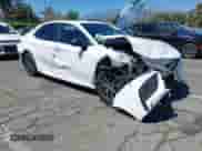 2021 Toyota Camry SE Nightshade z VIN 4T1G11AK8MU433769, wystawiony jako IAAI lot #43150076 z przebiegiem 92 123 mil mil oraz . Historia ofert i sprzedaży dostępna na DreamBid. Obrazek 1.