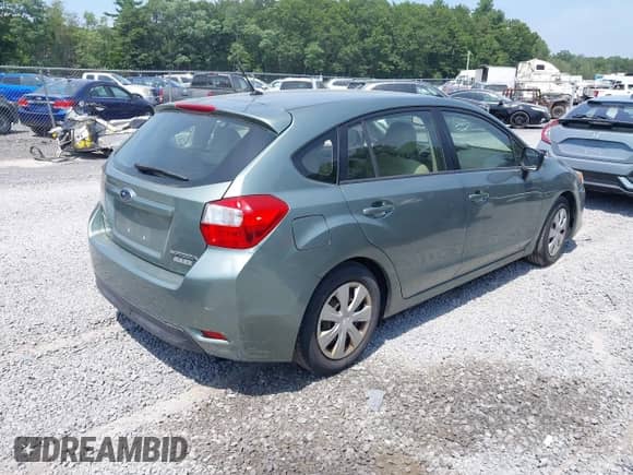 2014 Subaru Impreza 2.0i with VIN JF1GPAA62E8254617, listed as a IAAI auction lot 42816613 with 135,797 mi miles and . Bid and sale history available at DreamBid. Image 4.