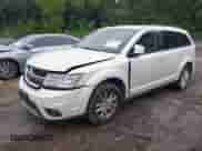 2014 Dodge Journey SXT with VIN 3C4PDCBB8ET121467, listed as a IAAI auction lot 43081106 with 260,518 mi miles and . Bid and sale history available at DreamBid. Image 2.