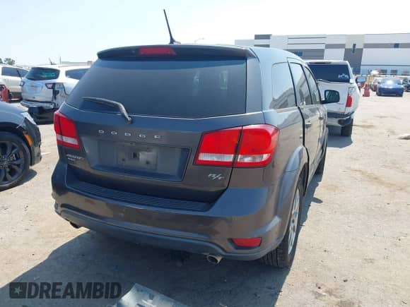 2015 Dodge Journey R/T with VIN 3C4PDDEG5FT593771, listed as a IAAI auction lot 43186280 with 114,639 mi miles and . Bid and sale history available at DreamBid. Image 4.