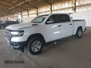 2023 Ram 1500 Tradesman z VIN 1C6SRFGT2PN694423, wystawiony jako Copart lot #65336245 z przebiegiem 14 793 mil mil oraz Szkoda całkowita • Salvage title. Historia ofert i sprzedaży dostępna na DreamBid. Obrazek 1.