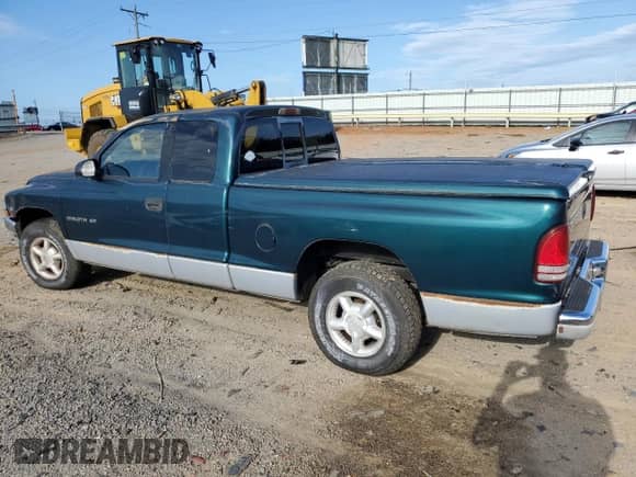 1997 Dodge Dakota с VIN 1B7GL23X4VS204175, выставлен на аукционе Copart как лот 65216755 с пробегом Не указан миль и Списание • Salvage title. История ставок и продаж доступна на DreamBid. Изображение 2.